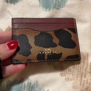 Coach cheetah print card case